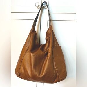 Metallic gold leather hobo bag
